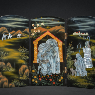 Nativity triptych with Holy Family in manger at center. Left has 3 Magi on camels. Right has 2 people with a city in the background.