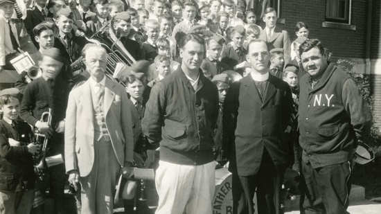 Lou Gehrig and Babe Ruth visit Father Edward J. Flanagan, founder of Boys Town, and young residents of the Nebraska school in 1927. Knights of Columbus Multimedia Archives/Photo by Ernest Bihler Co.