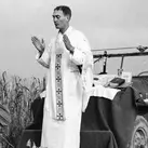 Using the hood of his jeep as an altar, U.S. Army chaplain Father Emil Kapaun celebrates Mass in Korea