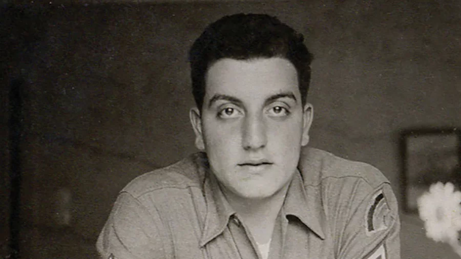 Charles J. Palmeri, who served in an Army division that helped liberate the Dachau concentration camp, is pictured in uniform in 1946.