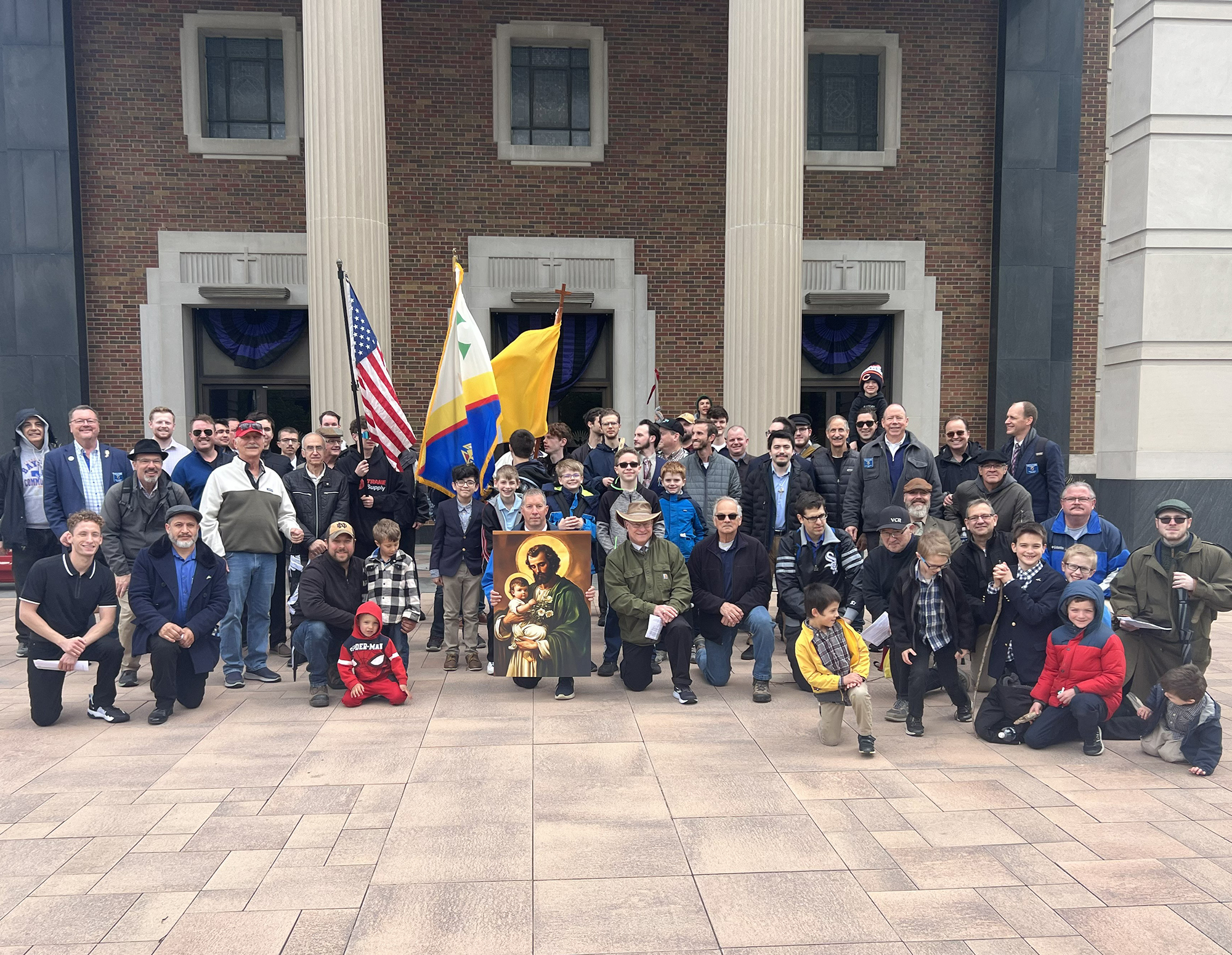 Chicago Knights pause for prayer at the Cathedral of St. Raymond Nonnatus in Joliet, Illinois.