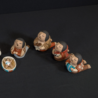 Crèche from the Cochiti Pueblo featuring Holy Family, three Magi, a donkey, a lamb, and an ox. 