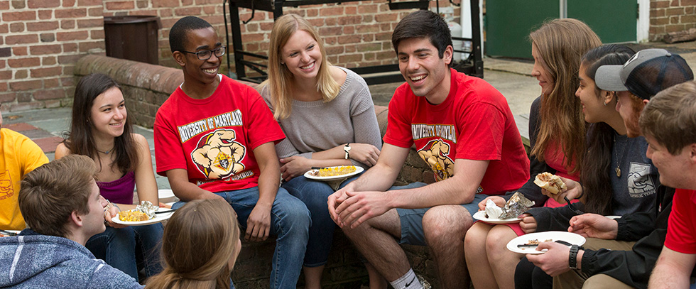 Members of Council 13295 and other University of Maryland students enjoy the council&rsquo;s cookout at the Catholic Student Center on April 28, 2018.