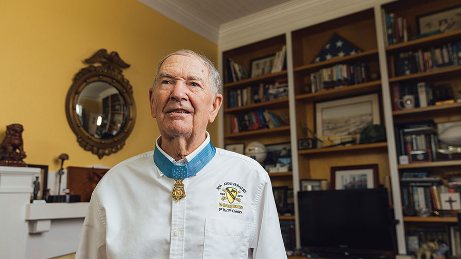 Retired Col. Marm wears the Medal of Honor in his home in Fremont, N.C.