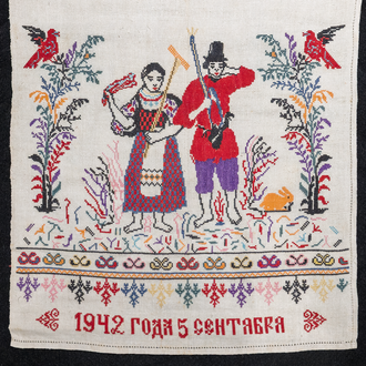 Detail image of embroidered Rushnyk from Central Ukraine depicting a man and woman off to harvest with the date “September 5, 1942” beneath. 