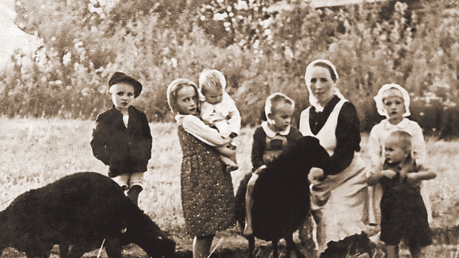 A photo taken by Józef Ulma shows Wiktoria and their children on the family farm in Markowa, Poland, in 1943.