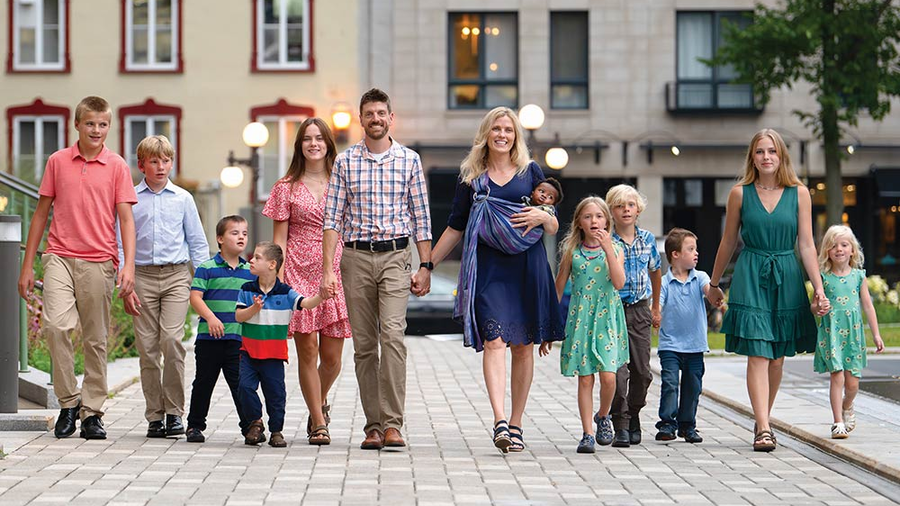 Joe and Tiffany, with 11 of their 13 children, are pictured in Québec City during the 142nd Supreme Convention, during which they were honored as the Knights of Columbus International Family of the Year. (Photo by Tamino Petelinšek)