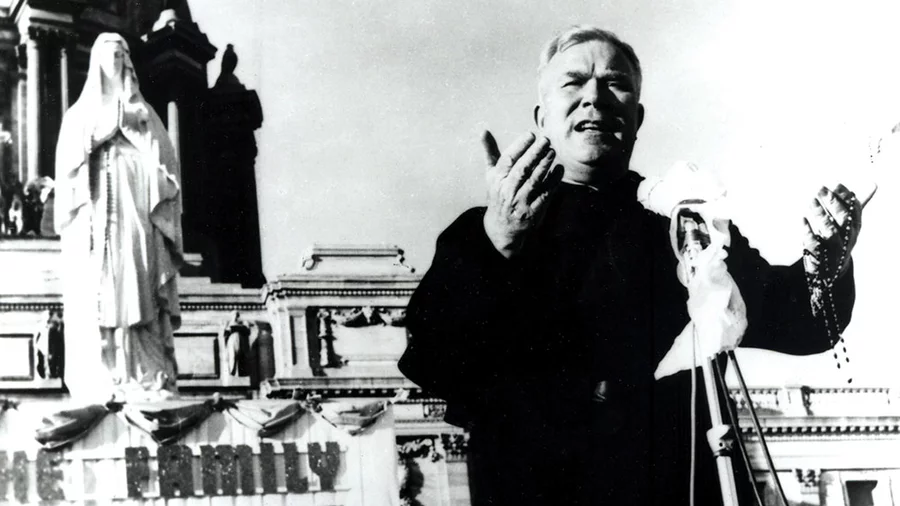 Father Patrick Peyton speaks outside the Cathedral of St. Paul in St. Paul, Minn., in 1958