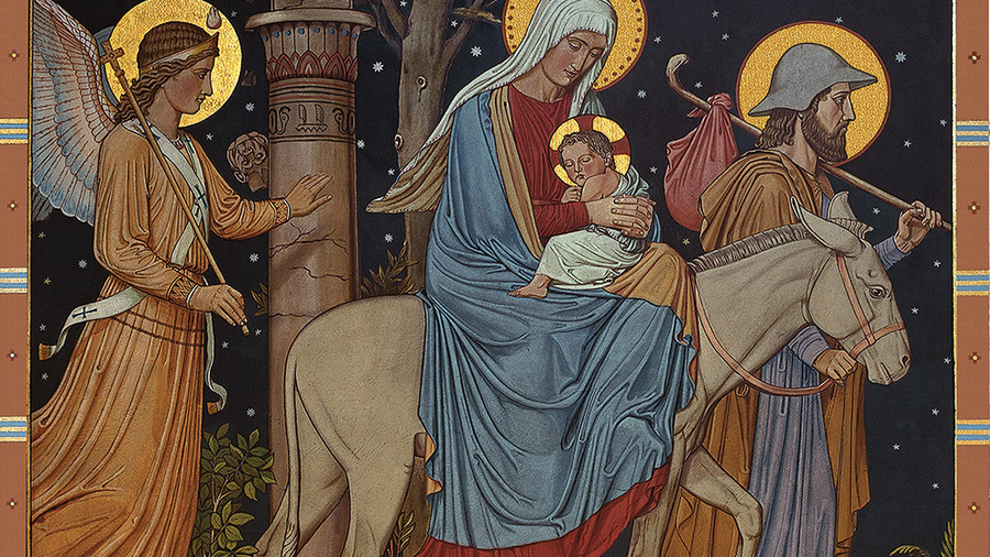 Joseph leading Mary on a donkey with baby Jesus