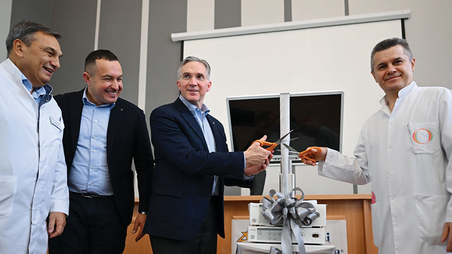 Supreme Knight Patrick Kelly and Dr. Fedir Yurochko cut the ribbon on a donated endoscopic device during the supreme knight’s visit to Okhmatdyt Children’s Hospital in Lviv