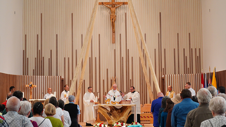 Archbishop Richard W. Smith of Edmonton celebrates a rededication Mass at Sacred Heart Church of the First Peoples on July 17. (Photo by Lincoln Ho)
