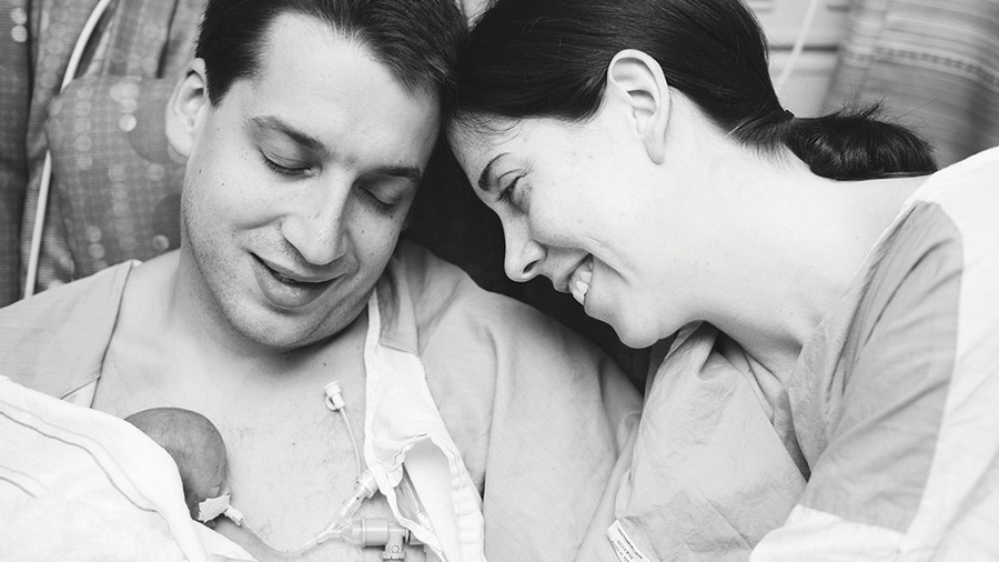 The authors spend final moments with their newborn daughter Abby in 2016. Abby and her twin sister, Maggie, were born at 24 weeks and died within two days.