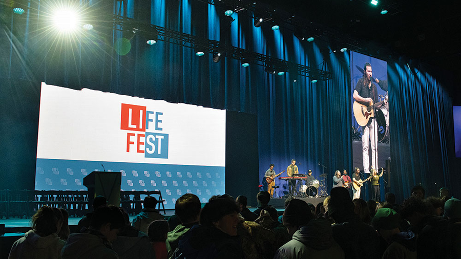 The musical group Damascus Worship leads participants in prayer and song at Life Fest Jan. 19 at the D.C. Armory in Washington. (Photo by Jeffrey Bruno)