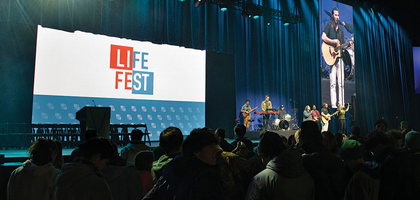 The musical group Damascus Worship leads participants in prayer and song at Life Fest Jan. 19 at the D.C. Armory in Washington. (Photo by Jeffrey Bruno)