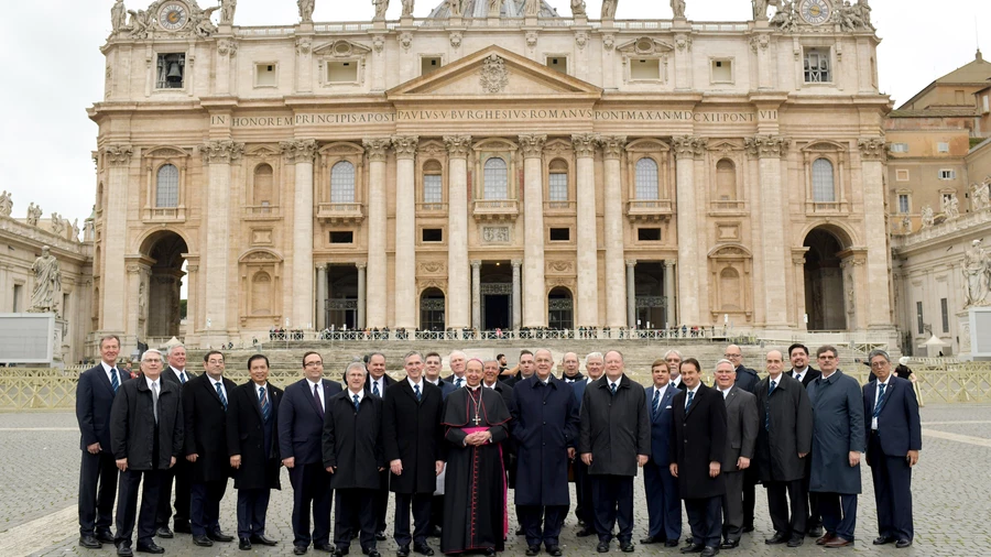 The Knights of Columbus Board of Directors and senior staff stand before the façade of St. Peter’s Basilica, which was renovated in the 1980s with the Order’s support.