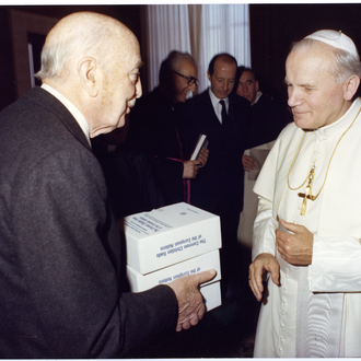 Count Enrico Galeazzi presents John Paul II with "The Common Christian Roots of the European Nations," printed with funds provided by the Order.
