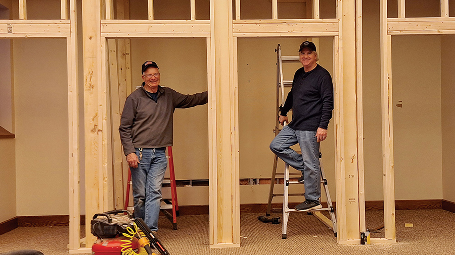 Pat Kash and Deputy Grand Knight Pat Finnegan, members of Msgr. O’Reilly Council 746 in Baraboo, Wis., work on the confessionals in St. Joseph Catholic Parish