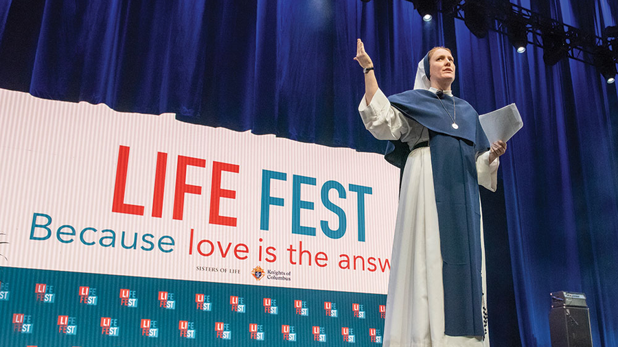 Sister Bethany Madonna of the Sisters of Life welcomes a crowd of several thousand young people to Life Fest.