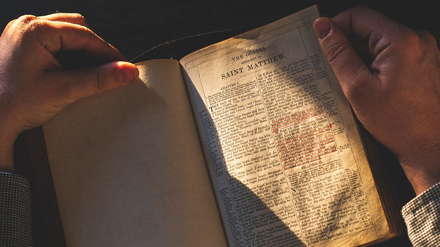 Man holding a bible