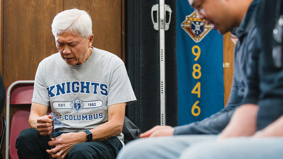 Past State Deputy Michael Yeo (left) and Jamey Guerrero, state director of evangelization and faith formation, join other men in praying the rosary during a Cor event hosted by St. Joseph Council 9846 in Port Moody, British Columbia, on June 4. (Photo by Sandra Leung/Yaletown Photography)
