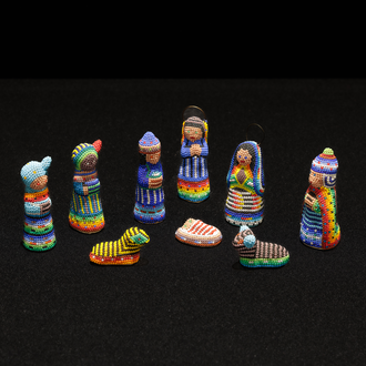 Beaded crèche from Mexico with Holy Family, Angel, 3 Magi, an ox, and a sheep.
