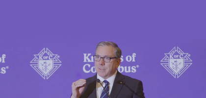 Michael McCusker gives a speech at the 2025 State Deputies meeting