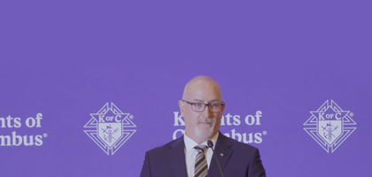 Jon Moulder gives a speech at the 2025 State Deputies meeting