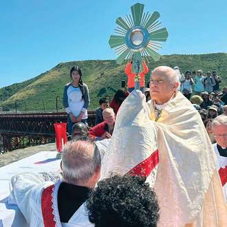 SERRA ROUTE | Archbishop Salvatore Cordileone of San Francisco raises the Blessed Sacrament after leading a pilgrimage walk across the Golden Gate Bridge on May 19, launching the Serra Route of the National Eucharistic Pilgrimage. (Photo by Roselle Reyes/EWTN News).
