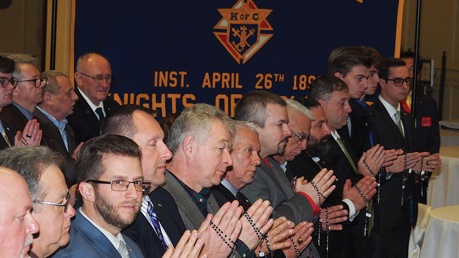 Men participate in the exemplification of charity