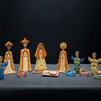 Nativity from Nicaragua with brightly painted figures of the Holy Family, 3 Magi, 4 angels, and 4 cherubs were carved from cedar wood
