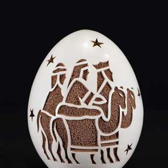 Crèche made in 2021 from Nicaragua. Painted clay egg decorated with 3 Magi, 2 camels, and stars.