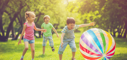 Card for Praesidium Academy with children playing with a large ball