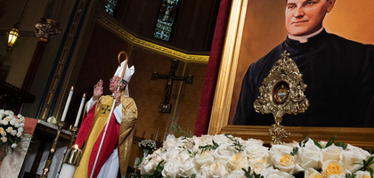 A relic and portrait of Father McGivney are displayed in the sanctuary of St. Mary’s Church