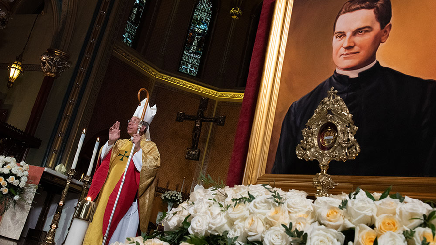 A relic and portrait of Father McGivney are displayed in the sanctuary of St. Mary’s Church