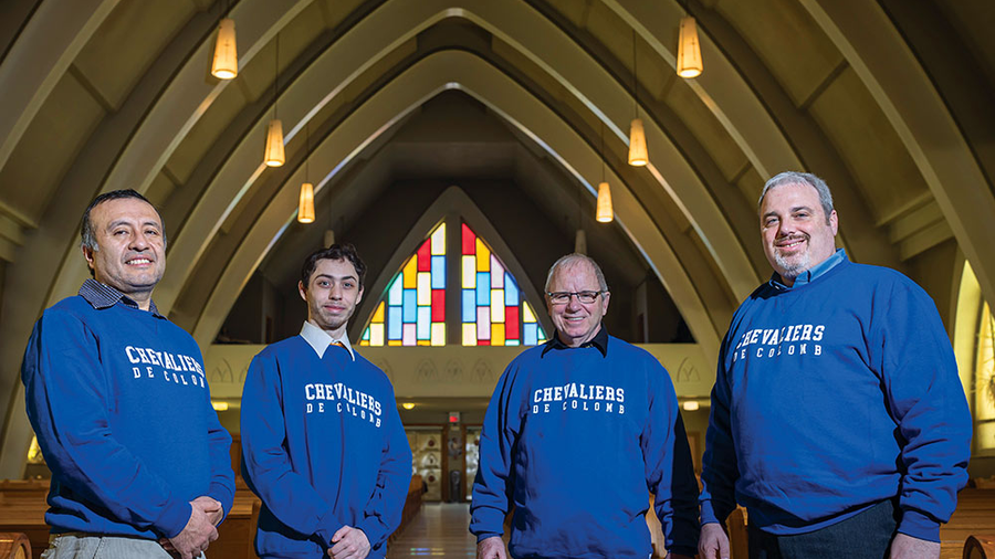 Past Grand Knight Francis McKen and other council members gather at the Church of Notre-Dame-de-Recouvrance in Québec City