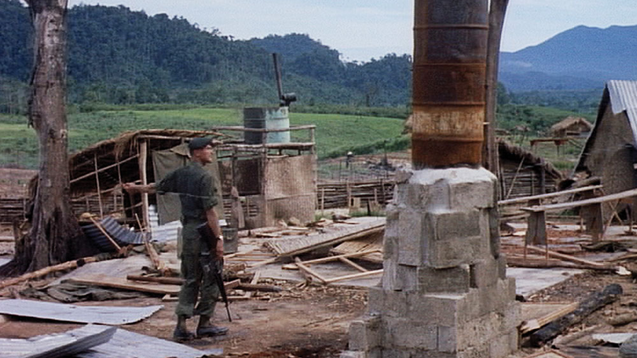 U.S. Army footage, Capt. Donlon surveys the ruined camp