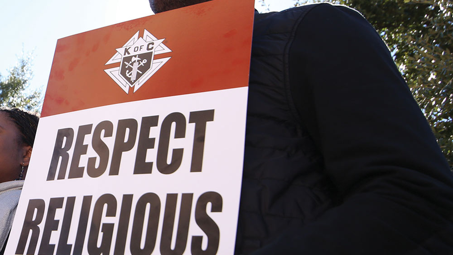 A man participates in a religious freedom rally organized by Knights of Columbus in Austin, Texas, in 2015.