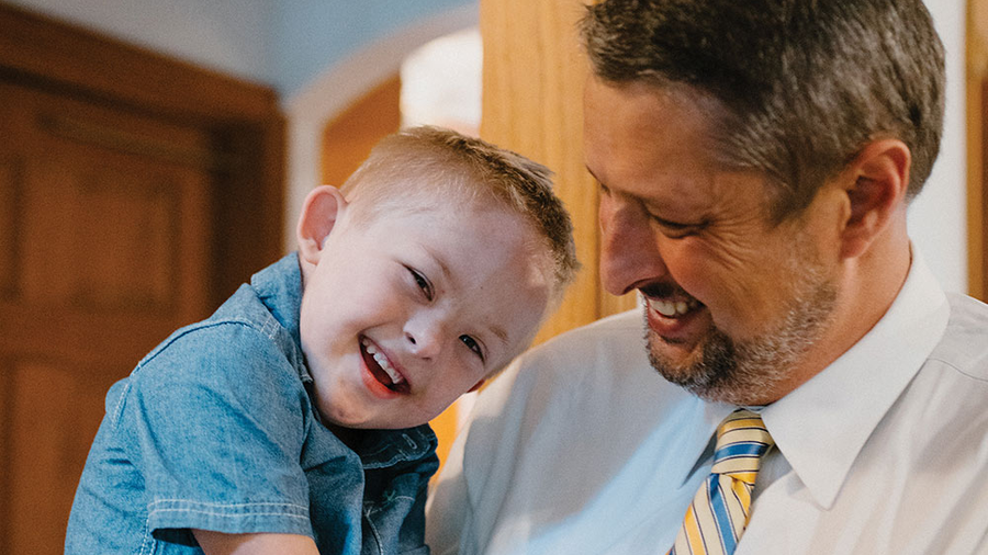 Daniel Schachle laughs with his son Mikey