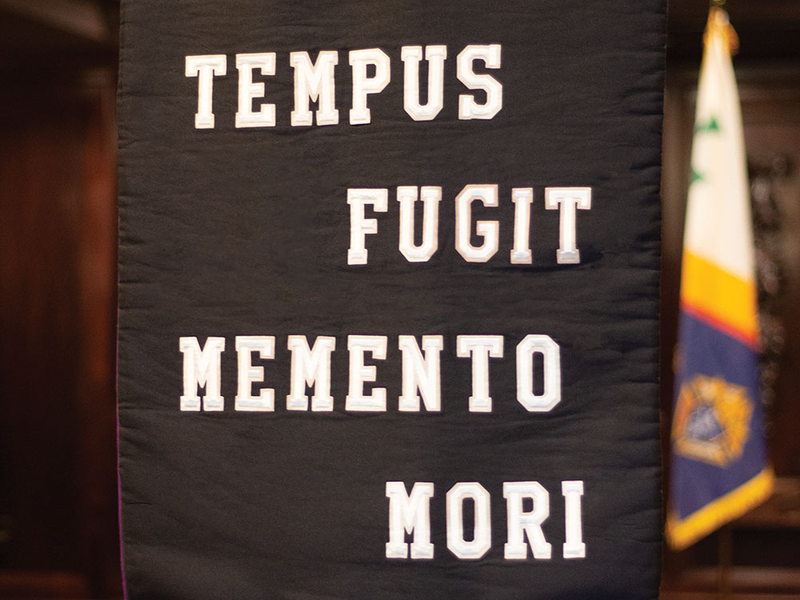 A banner that reads Time flies. Remember death