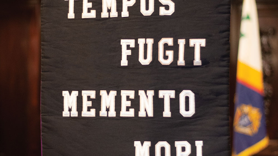 A banner that reads Time flies. Remember death