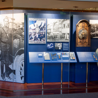 Photo of the Wall of History exhibit where it discusses the Knights of Columbus wartime relief efforts during World War I.
